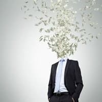 businessman with dollars head