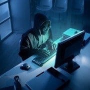 Hacker stealing data from computer