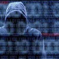 Silhouette of a hacker isloated on black